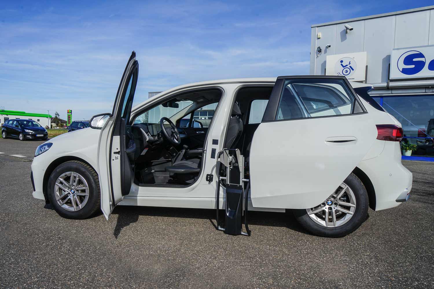 Behindertengerechter BMW 218i Activetourer, Selbstfahrerumbau, Handicap, MFD, Handgerät, Rutschbrett, Rollstuhlverladesystem, Sodermanns