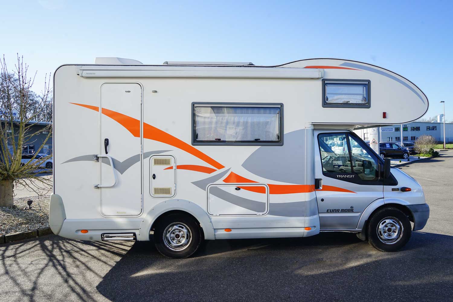 Behindertengerechtes Ford Profila Reisemobil, Beifahrerumbau, automatische doppel Trittstufe, Fernbedienung, Sodermanns