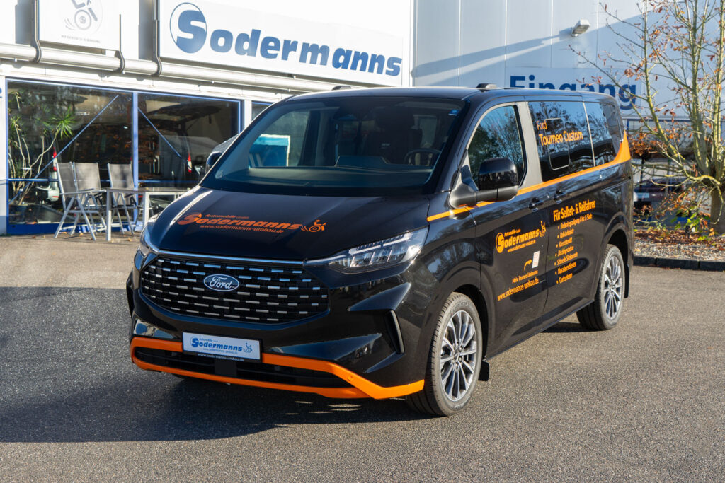 Ford-Custom-front Behindertengerechter Ford Tourneo Custom Vorführfahrzeug für Selbst- und Beifahrer, Unterflurkassettenlift, Bodenbegradigung, Dockingstation, Sodermanns