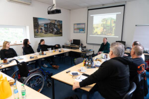Herstellerberatung der Berufsgenossenschaft bei Sodermanns, korrekte Rollstuhlsicherung während der Fahrt